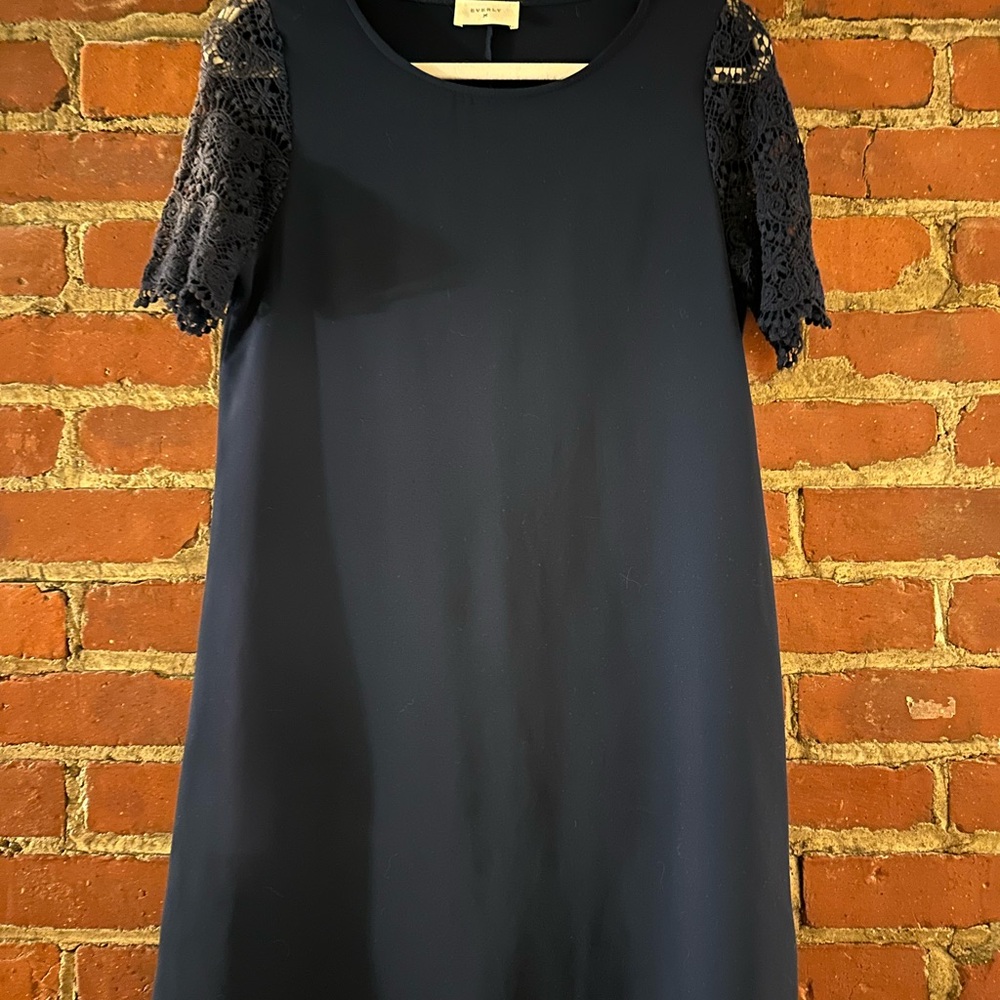 Elegant Navy Dress with Lace Sleeves